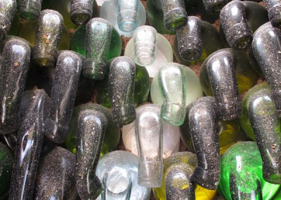 Melted glass bottles inside the kiln